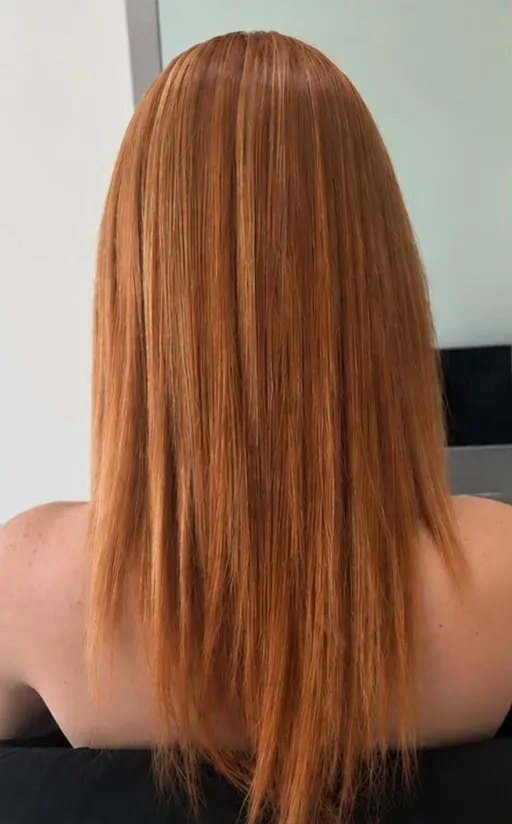 Before: shoulder-length straight copper hair