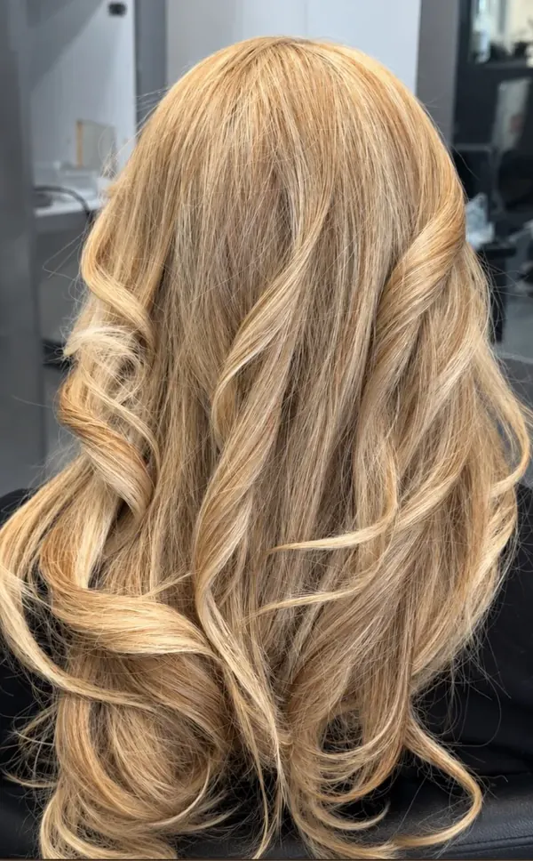 Blonde highlights with soft curls