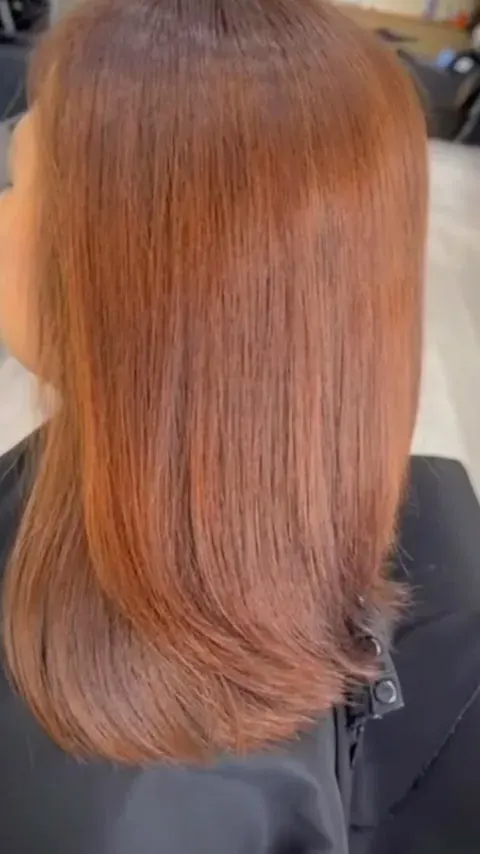 Freshly coloured copper hair, straight and shiny