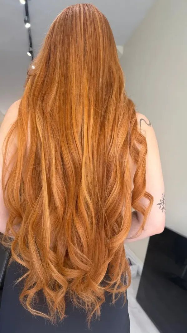 Long copper hair with extensions and refreshed colour