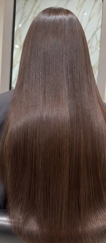 After keratin: glossy, straight brown hair
