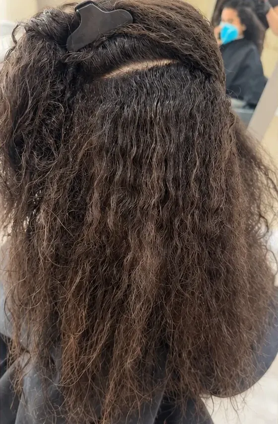 Before keratin: very curly, frizzy dark hair